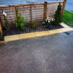 Small fencing and patio slab edge